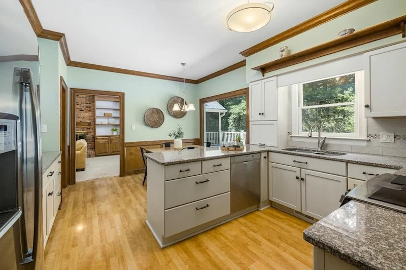 Cabinet with repaired water damage and refinished panels